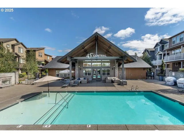 a room with gym equipment and windows