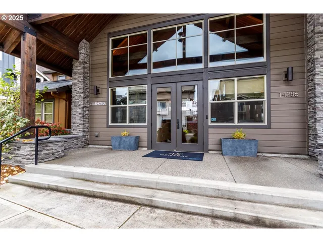a view of front door of house and front yard