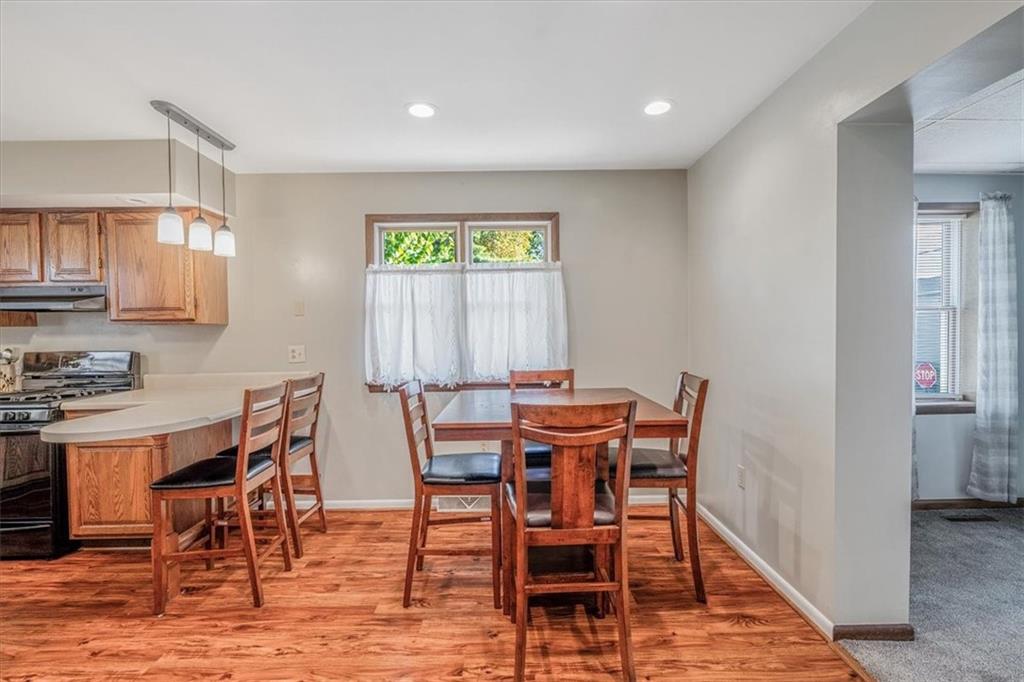 206 Washington Street Beaver, PA 15009 - Photo 14 of 32 a view of a dining room with furniture and wooden floor
