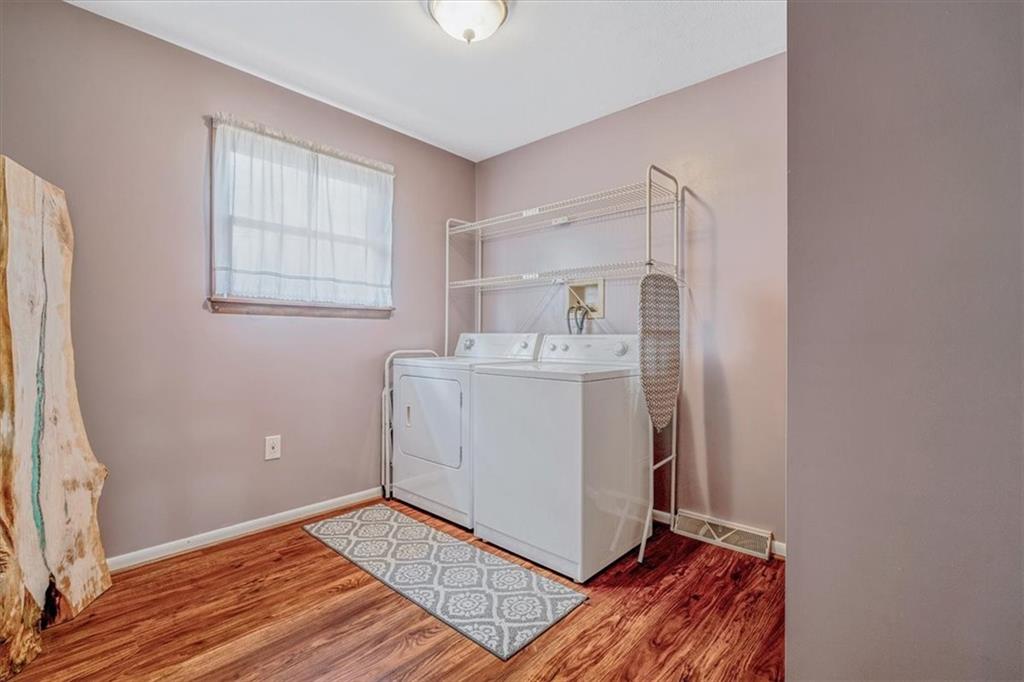 206 Washington Street Beaver, PA 15009 - Photo 20 of 32 a utility room with cabinets washer and dryer