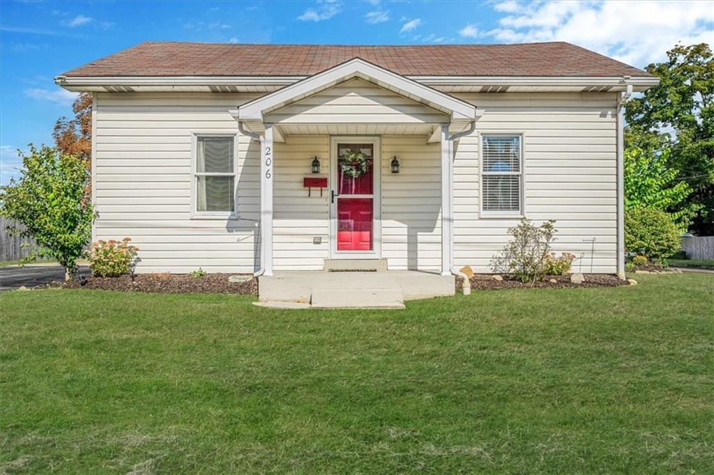206 Washington Street Beaver, PA 15009 - Photo 2 of 32 a front view of a house with a yard