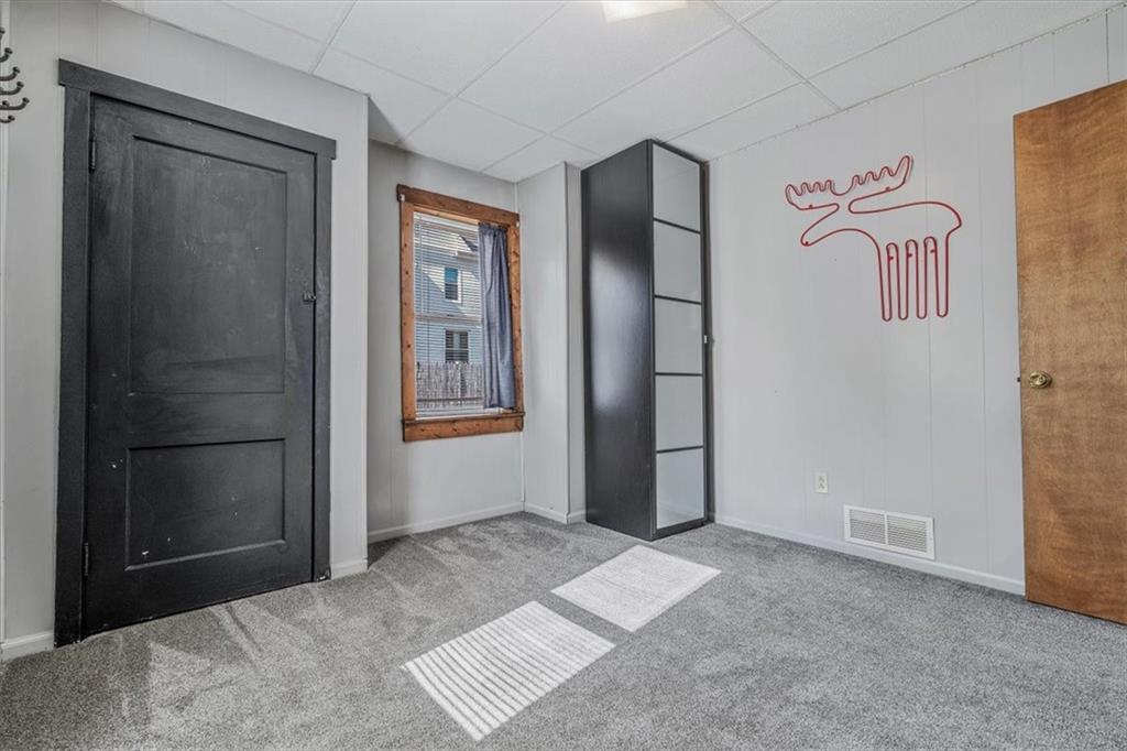206 Washington Street Beaver, PA 15009 - Photo 22 of 32 an empty room with windows and closet