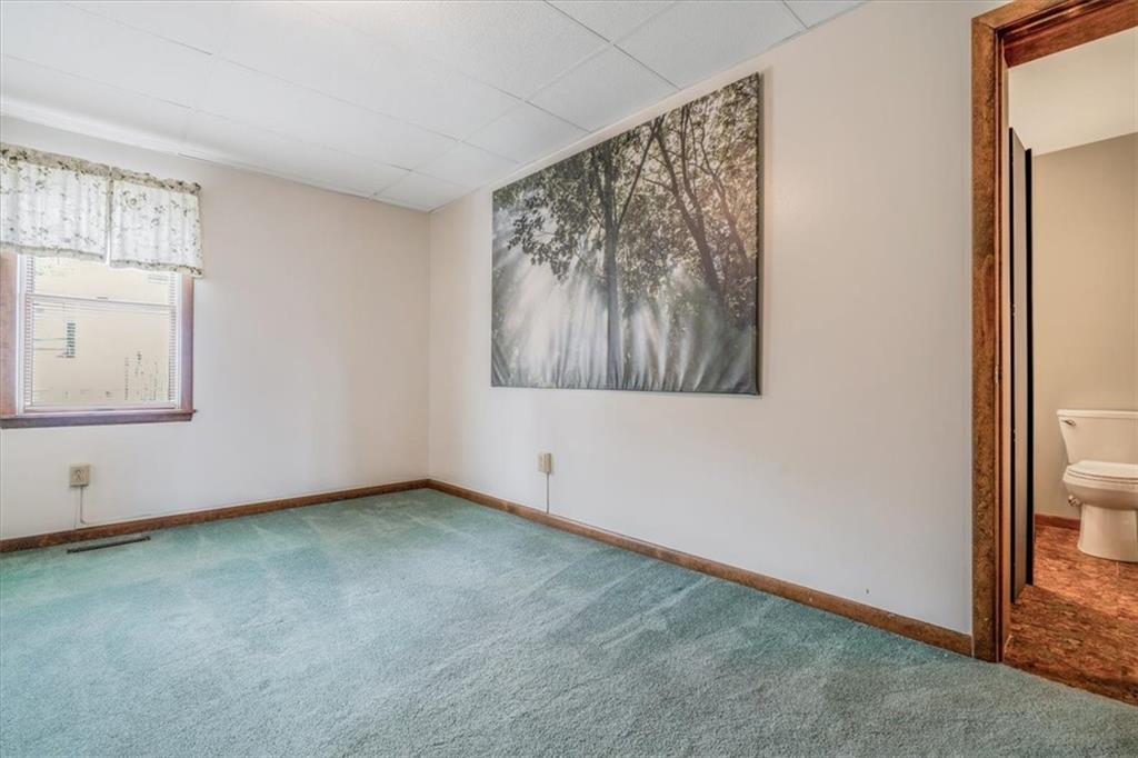 206 Washington Street Beaver, PA 15009 - Photo 25 of 32 an empty room with windows and closet