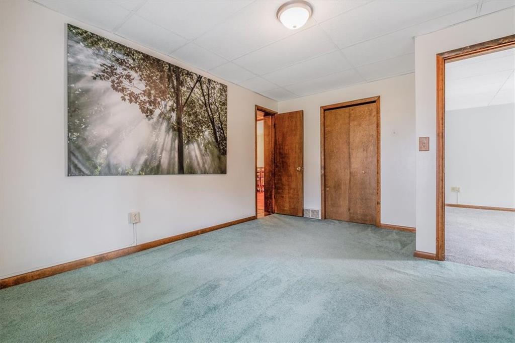 206 Washington Street Beaver, PA 15009 - Photo 26 of 32 an empty room with a painting on the wall