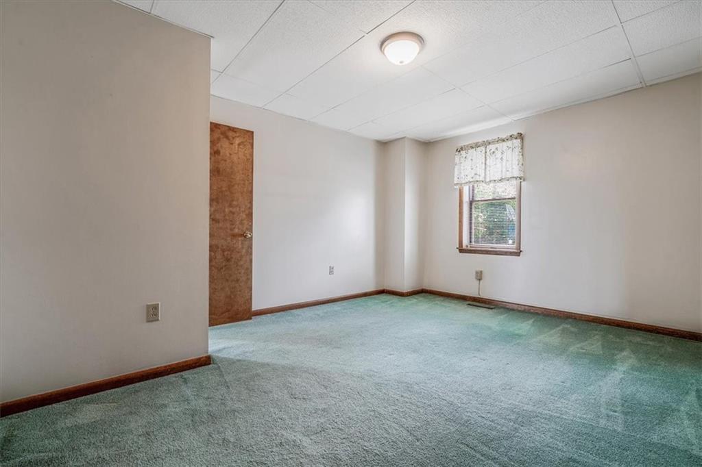 206 Washington Street Beaver, PA 15009 - Photo 27 of 32 an empty room with windows