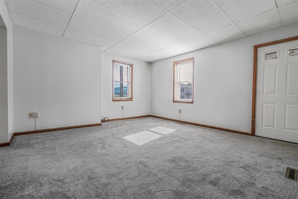 206 Washington Street Beaver, PA 15009 - Photo 8 of 32 an empty room with windows