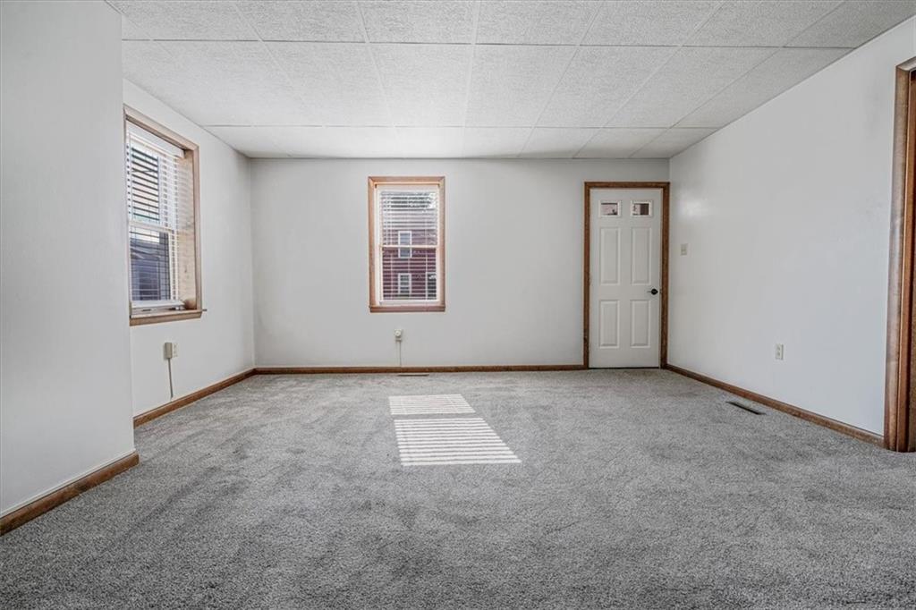 206 Washington Street Beaver, PA 15009 - Photo 9 of 32 an empty room with windows