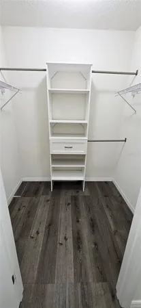 a bathroom with a sink vanity and mirror