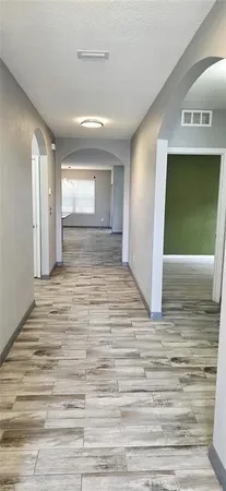 a view of hallway with stairs