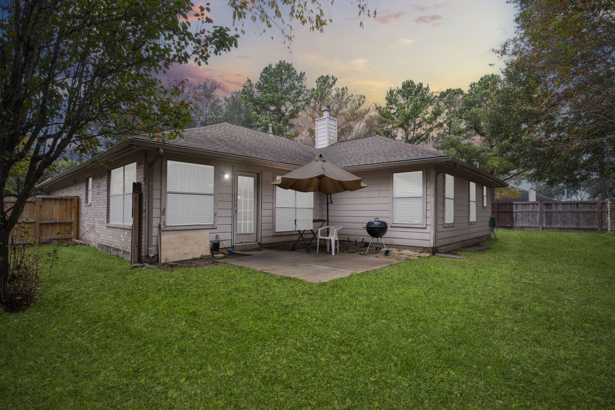 17238 Stonebridge Trail Houston, TX 77095 - Photo 24 of 25 a front view of house with yard and green space