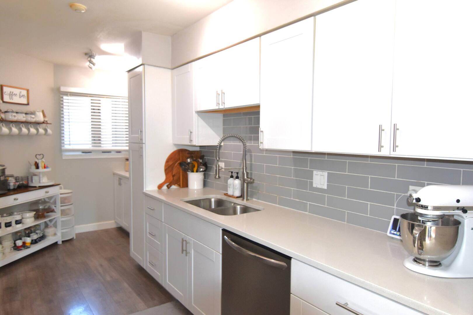 8301 High Point Circle, Unit C Darien, IL 60561 - Photo 14 of 35 a kitchen with a sink and cabinets