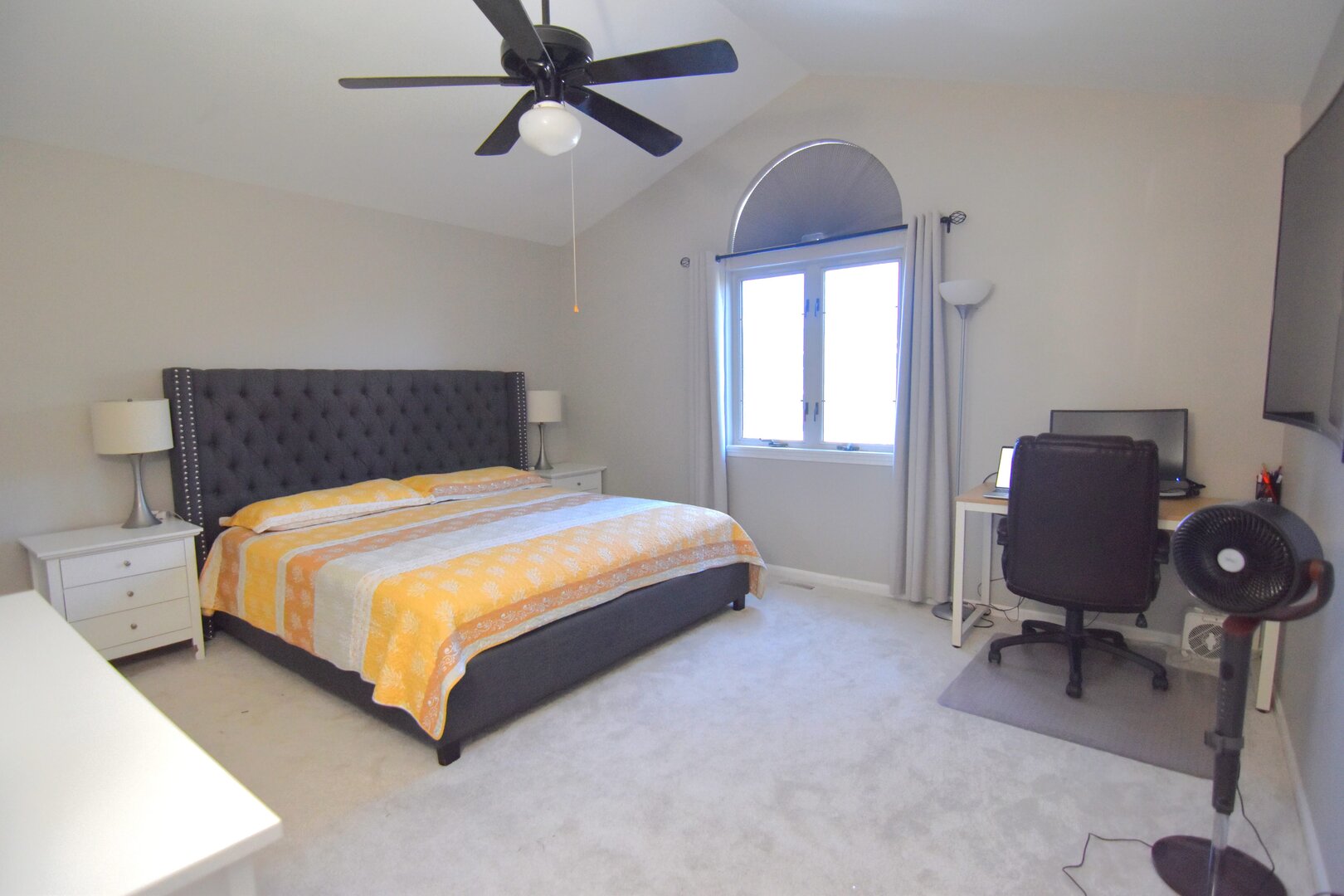 8301 High Point Circle, Unit C Darien, IL 60561 - Photo 24 of 35 a bed sitting in a bedroom next to a window