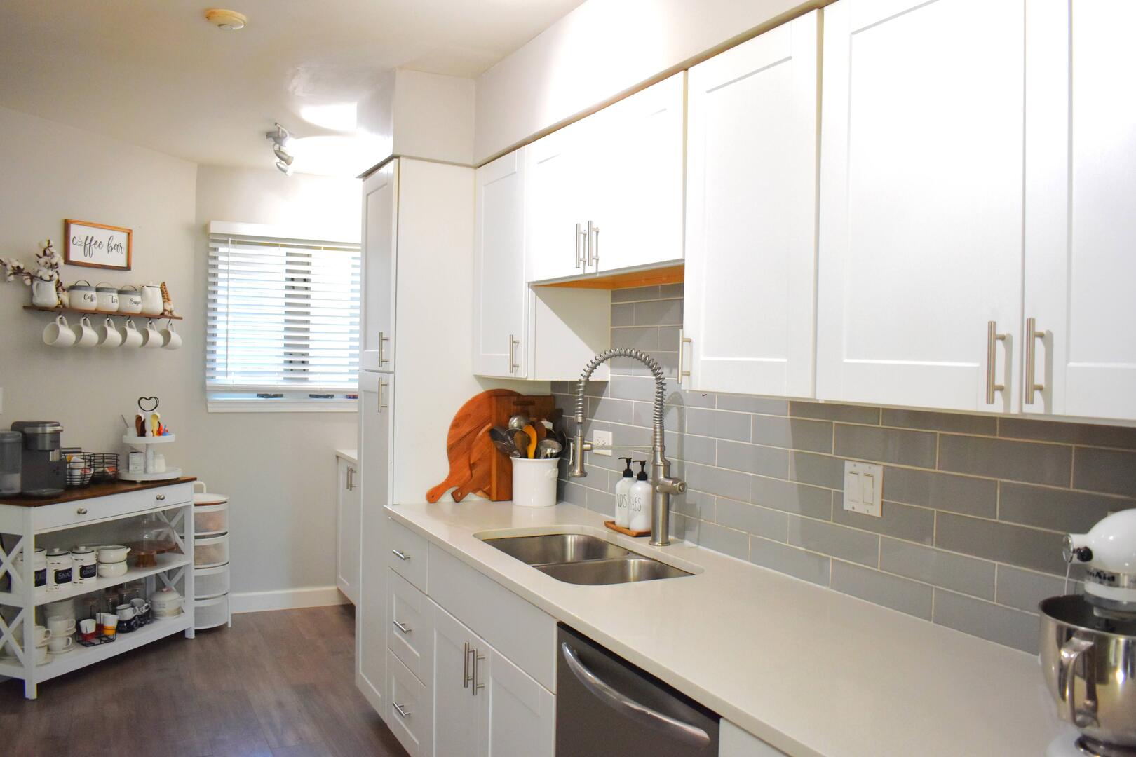 8301 High Point Circle, Unit C Darien, IL 60561 - Photo 10 of 35 a kitchen with a sink and a window
