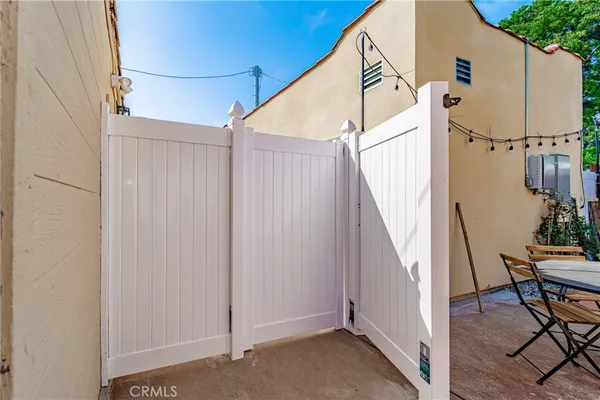 a view of a backyard of the house