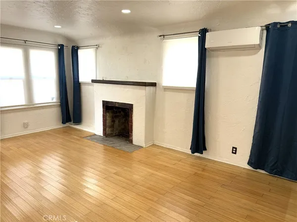 a view of a livingroom with a fireplace