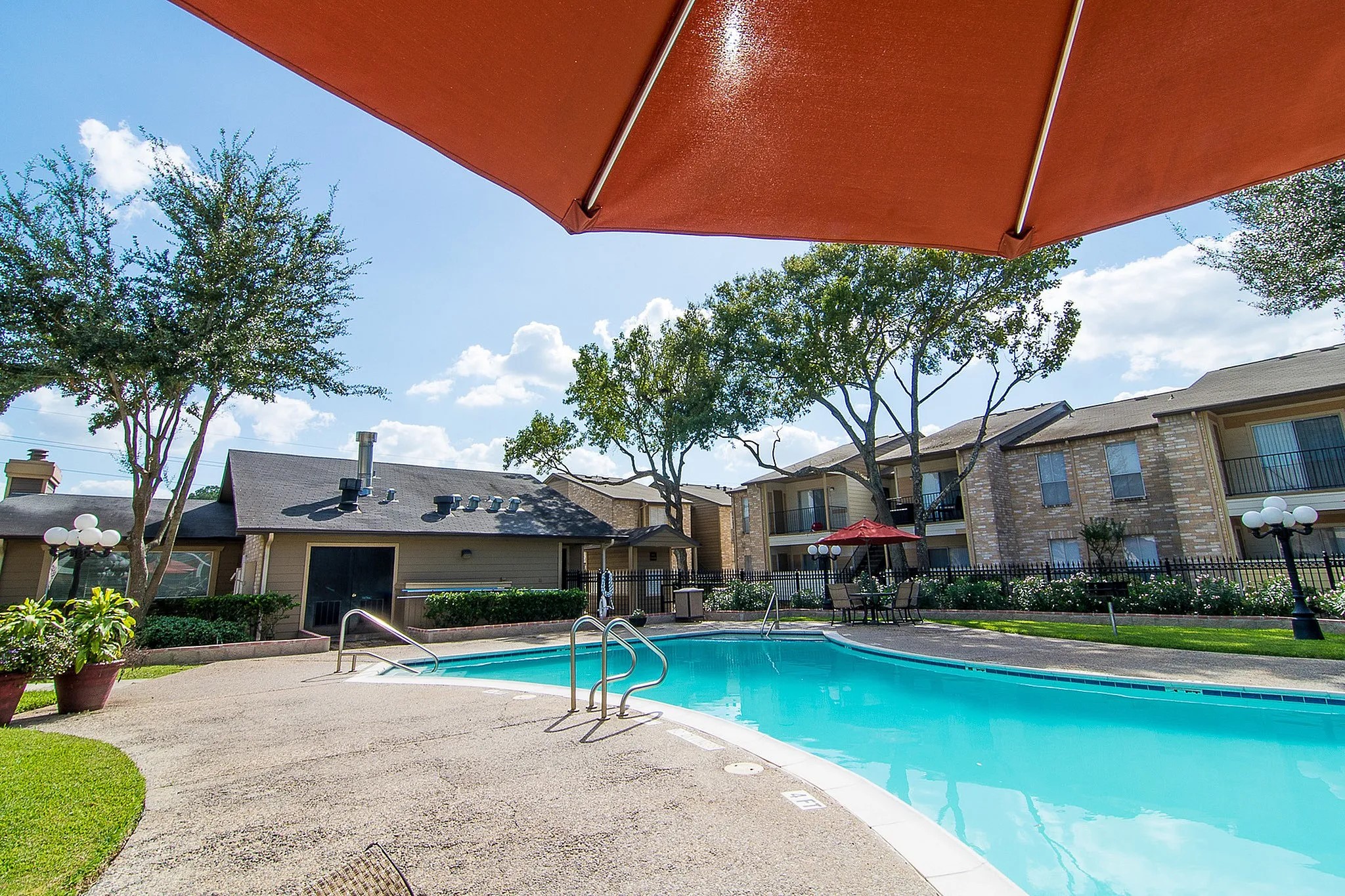 8455 Will Clayton Parkway, Unit 103 Humble, TX 77338 - Photo 2 of 23 a view of a house with swimming pool