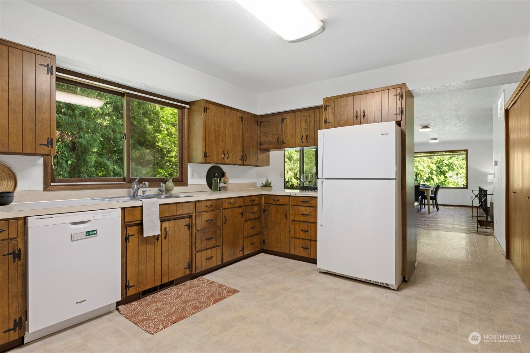 1100 Kelly Road Bellingham, WA 98226 - Photo 16 of 40 a kitchen with sink cabinets and refrigerator