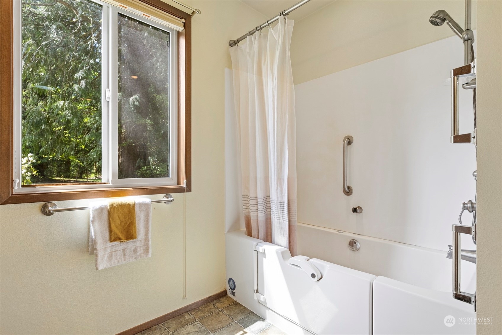 1100 Kelly Road Bellingham, WA 98226 - Photo 26 of 40 a bathroom with a bathtub and a shower