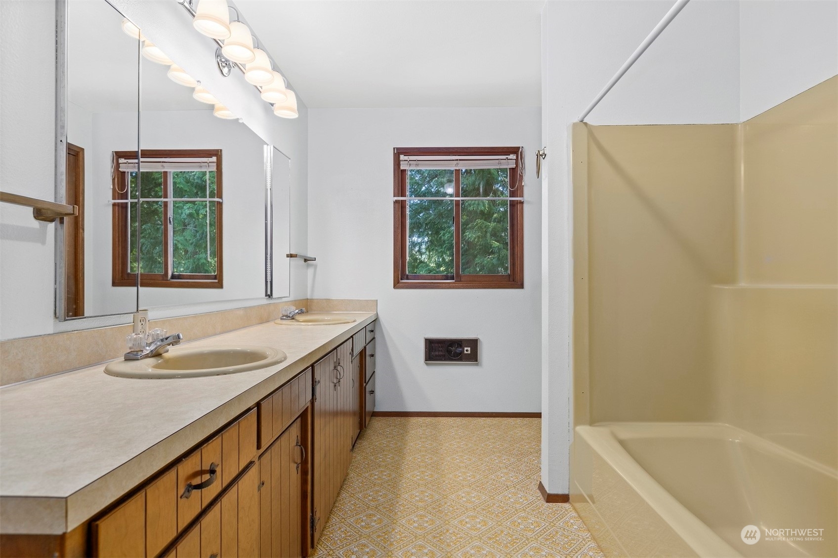 1100 Kelly Road Bellingham, WA 98226 - Photo 33 of 40 a bathroom with a tub sink and mirror
