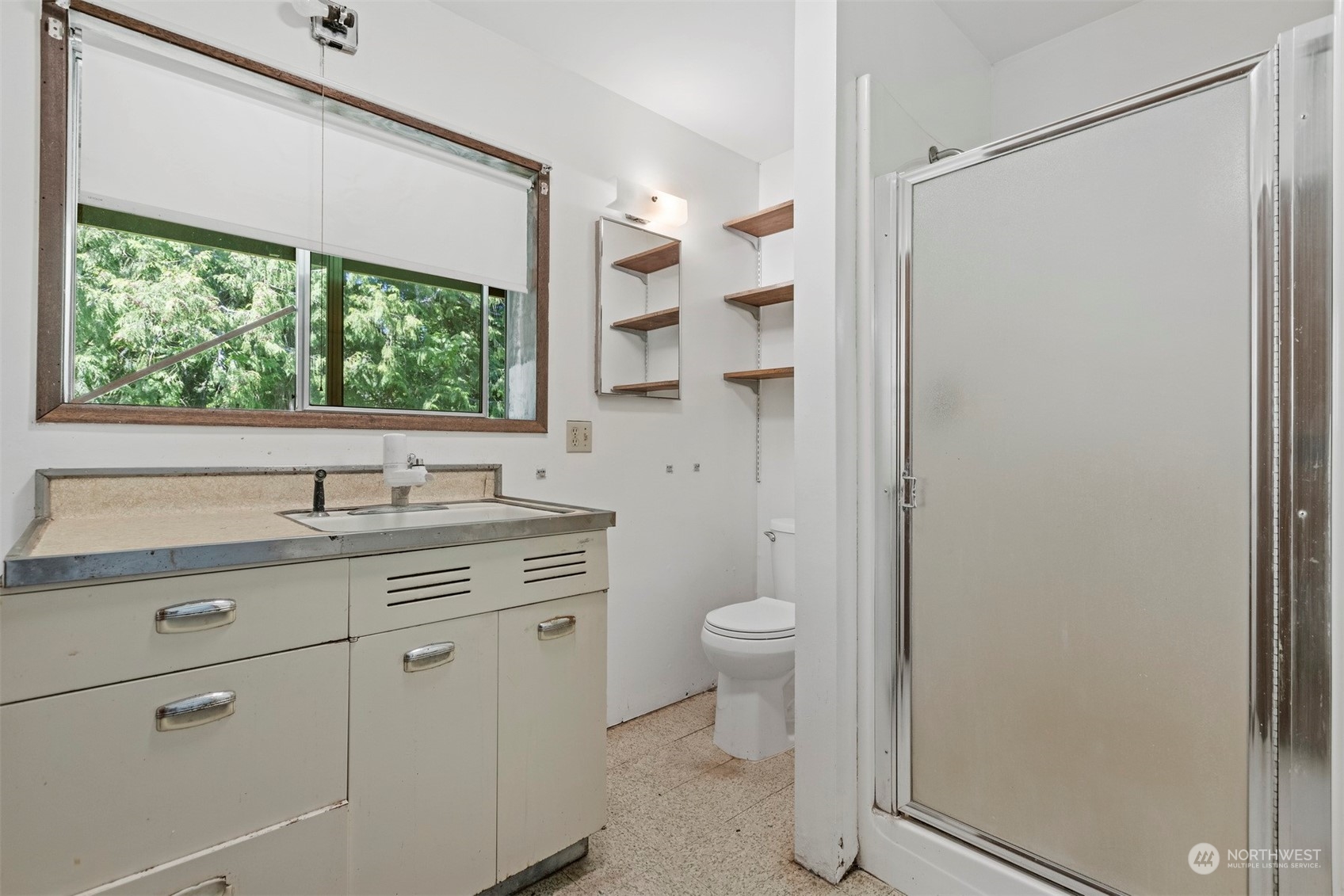 1100 Kelly Road Bellingham, WA 98226 - Photo 38 of 40 a bathroom with a granite countertop sink toilet and shower