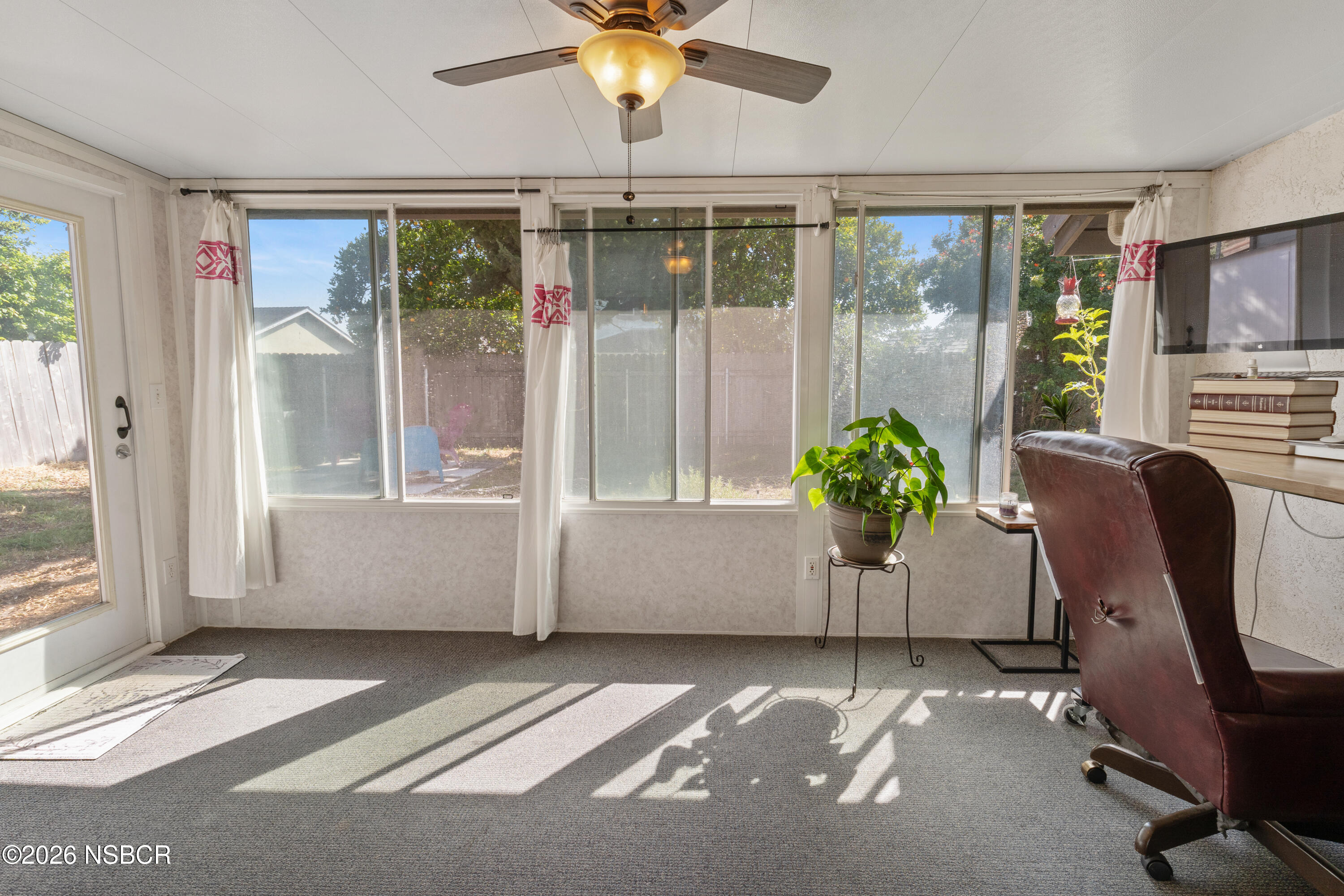 4220 Constellation Road Lompoc, CA 93436 - Photo 6 of 22 a view of a workspace with furniture and a window