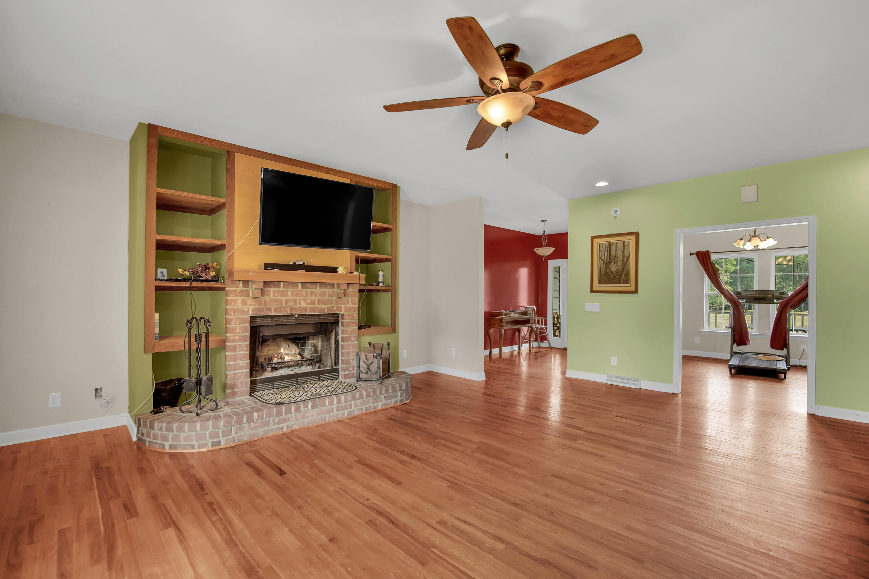 8925 Greenwood Road Adams Run, SC 29426 - Photo 12 of 31 Fireplace with built in shelves
