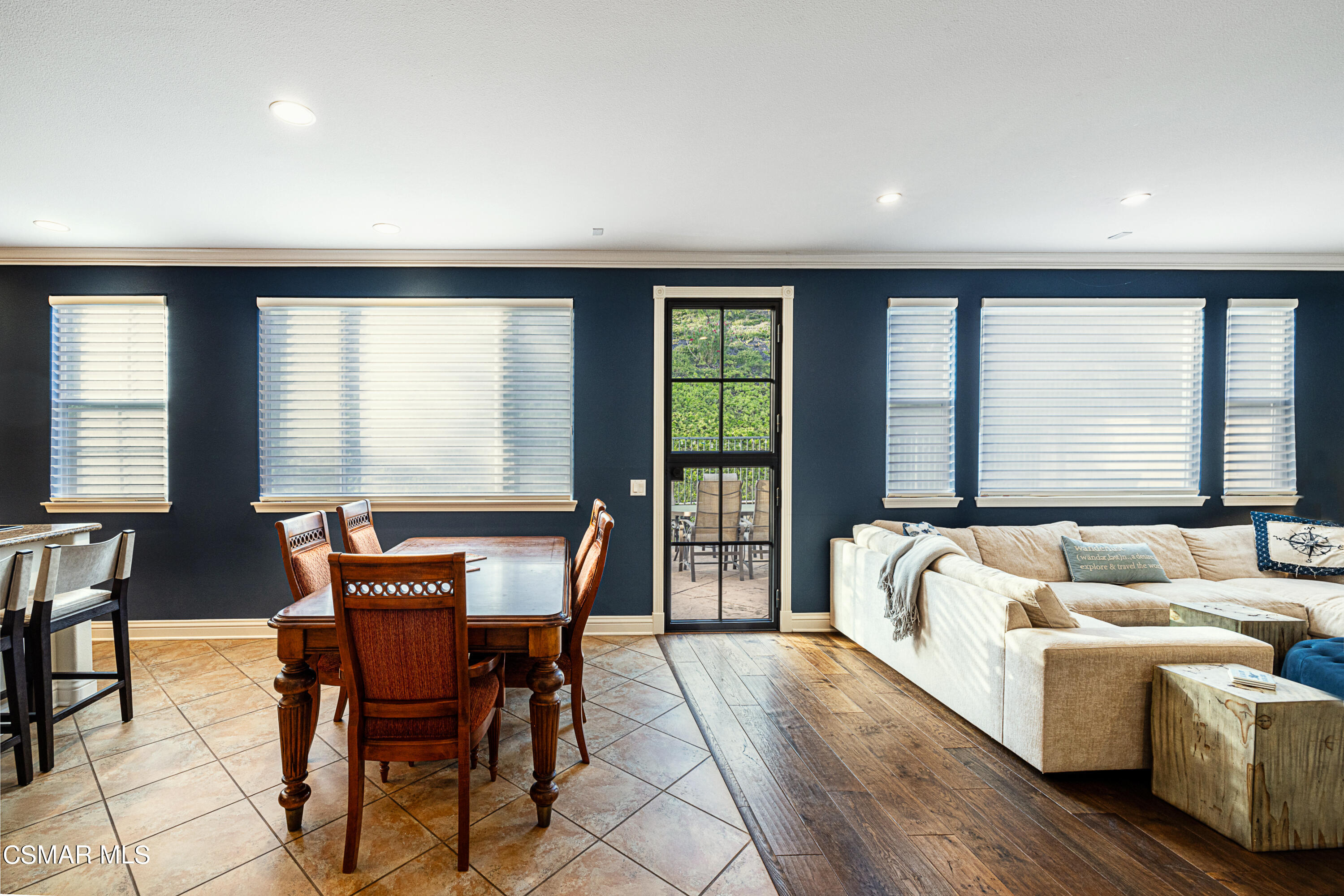 659 Corte Estrella Camarillo, CA 93010 - Photo 11 of 36 a dining room with furniture and a large window