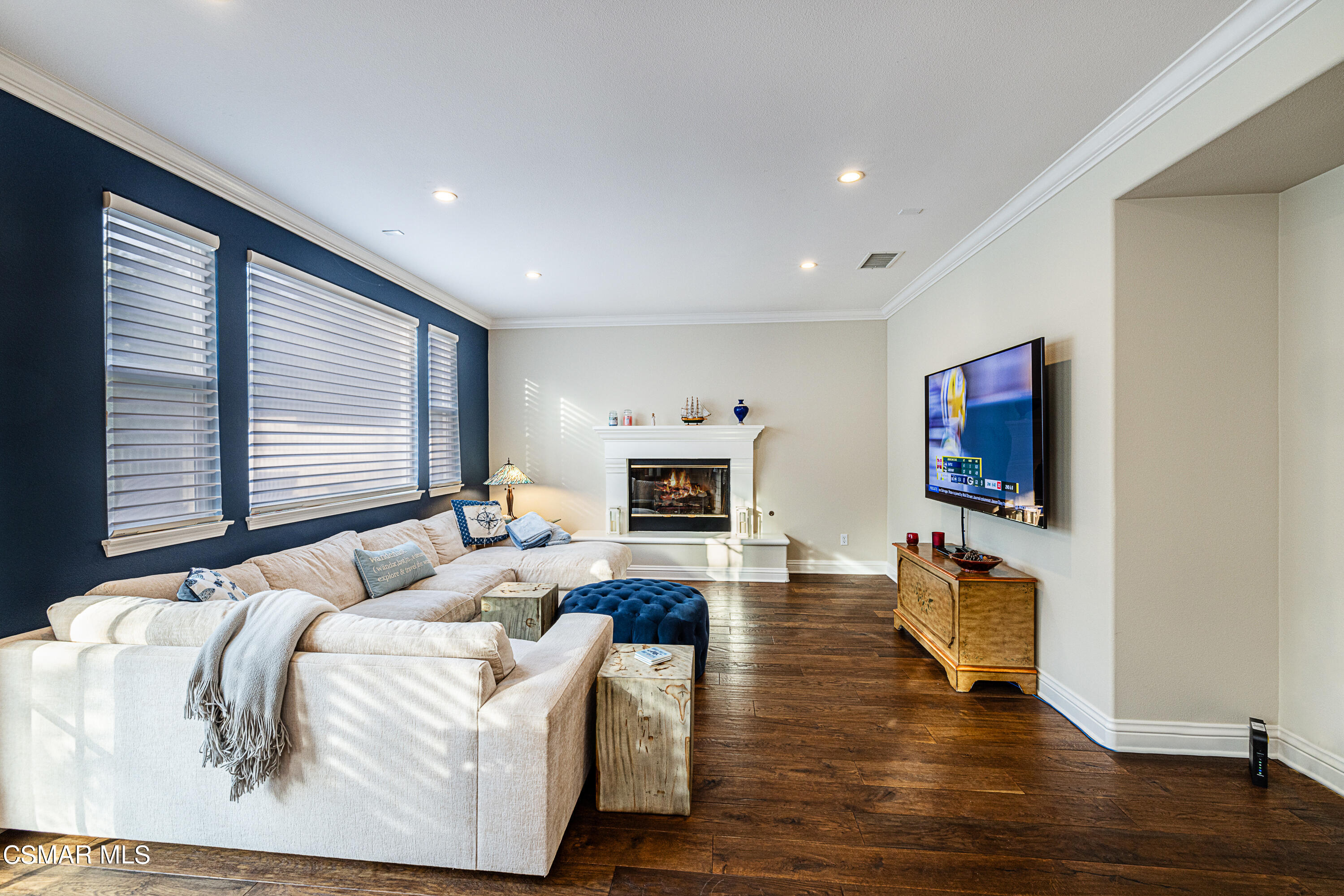 659 Corte Estrella Camarillo, CA 93010 - Photo 12 of 36 a bedroom with furniture and a flat screen tv