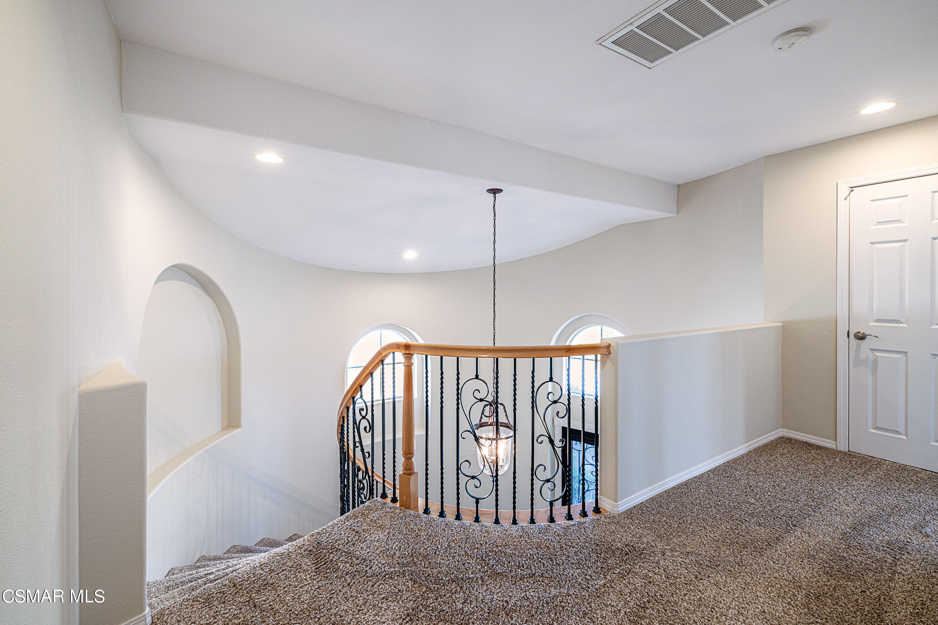 659 Corte Estrella Camarillo, CA 93010 - Photo 16 of 36 a view of a hallway with staircase