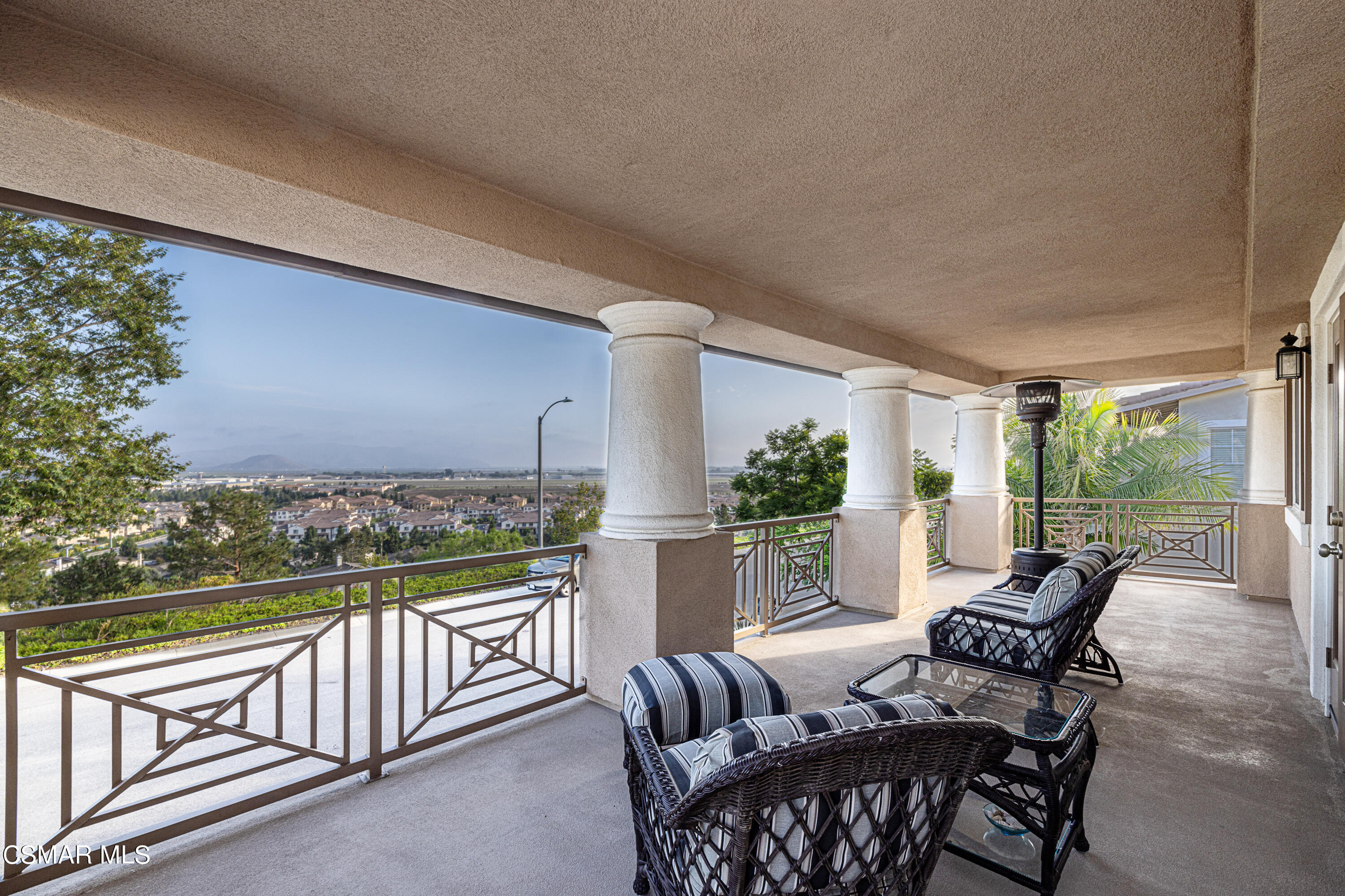 659 Corte Estrella Camarillo, CA 93010 - Photo 19 of 36 a view of a chairs and table in the balcony