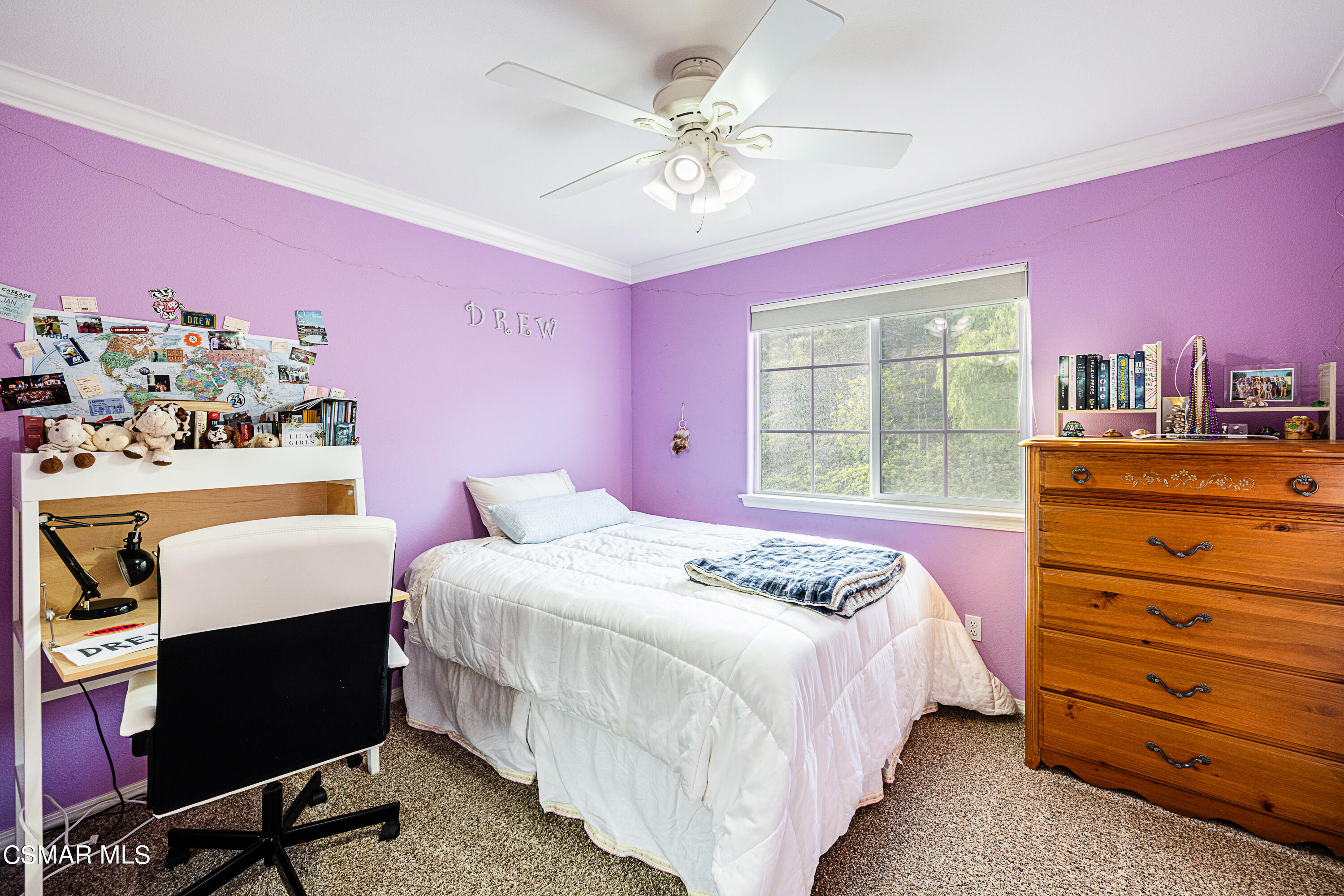 659 Corte Estrella Camarillo, CA 93010 - Photo 21 of 36 a bedroom with a bed a dresser and a window