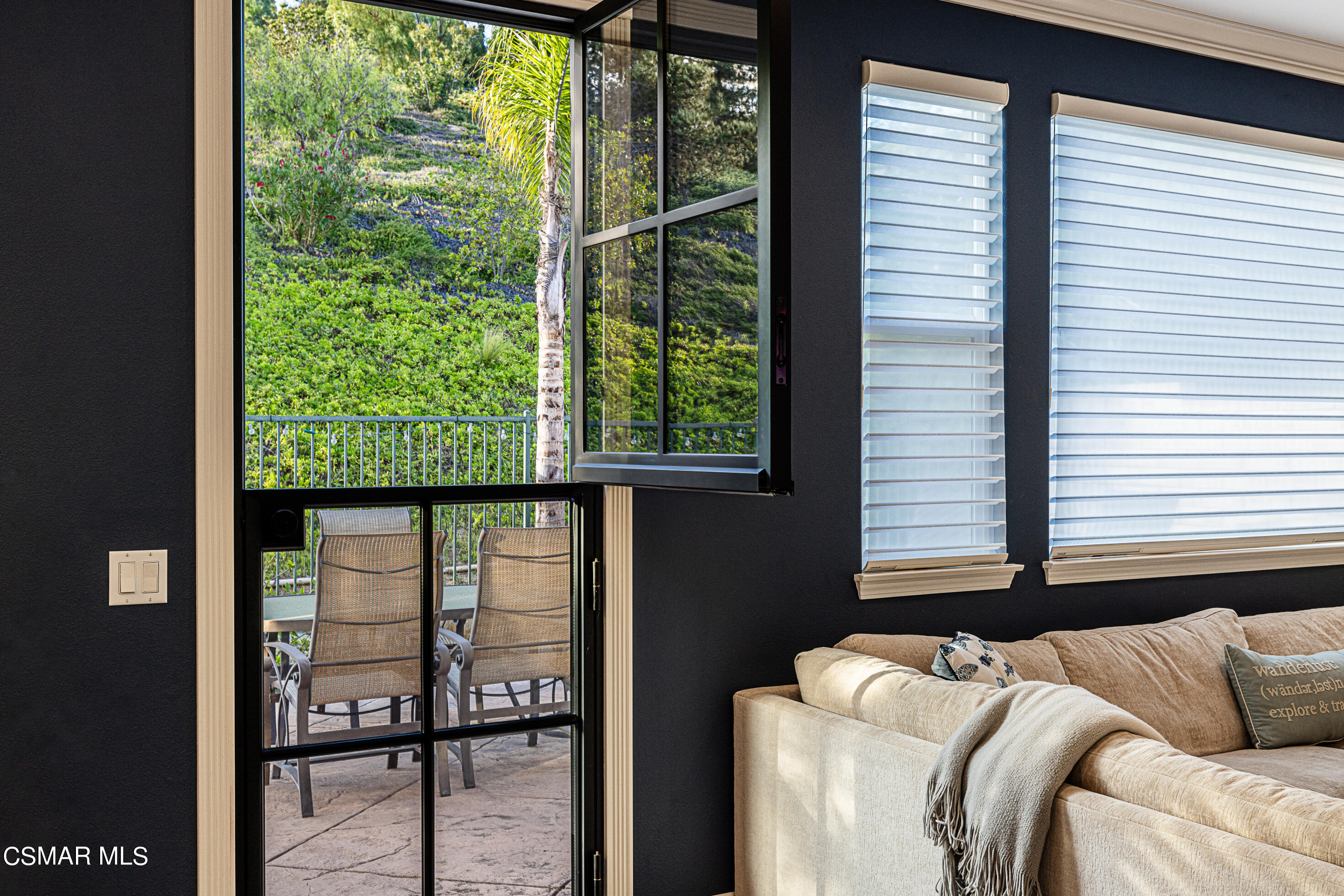 659 Corte Estrella Camarillo, CA 93010 - Photo 23 of 36 a living room with furniture and a window
