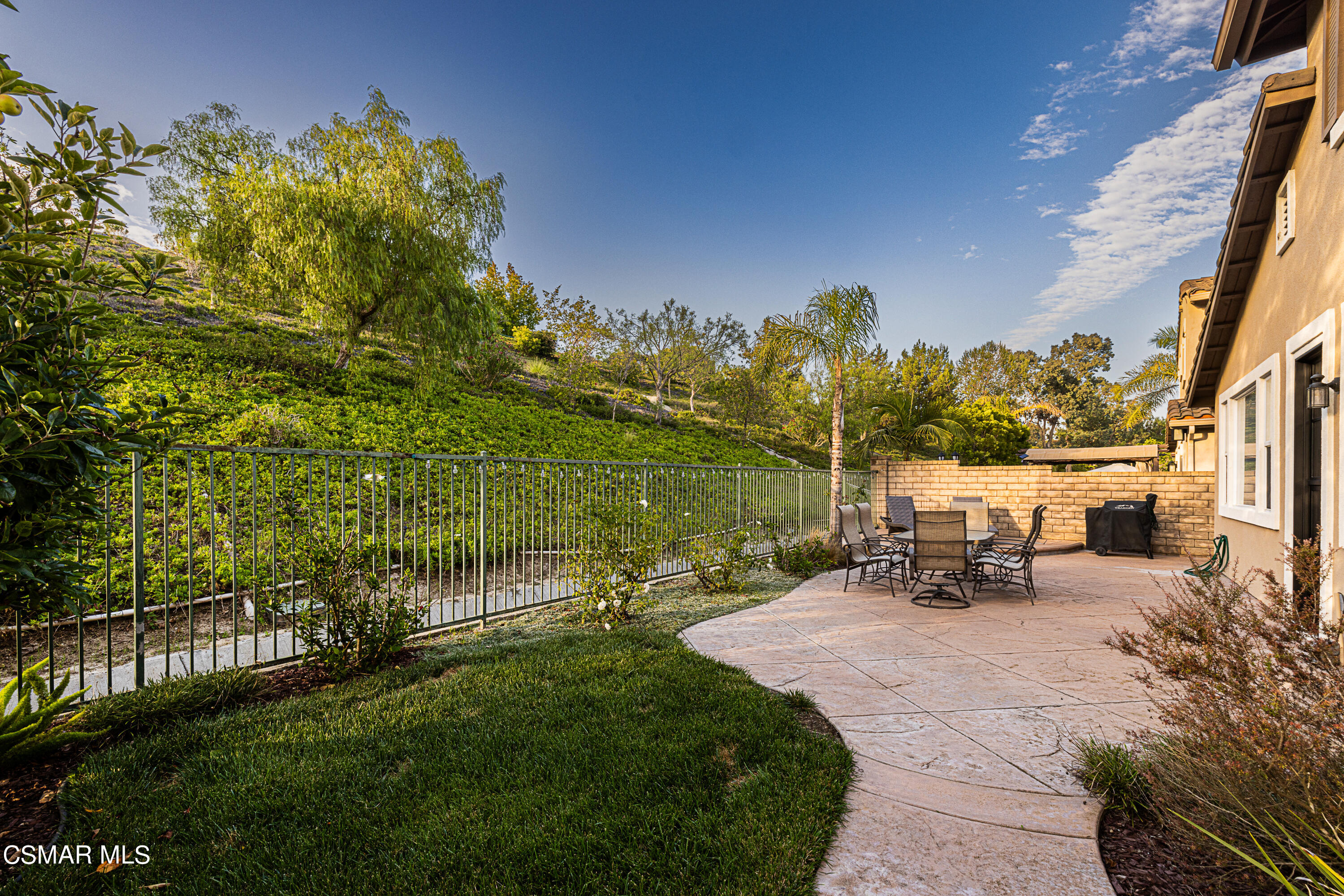 659 Corte Estrella Camarillo, CA 93010 - Photo 24 of 36 a view of a bench in the garden