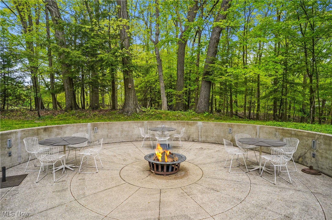3210 North Dover Road Stow, OH 44224 - Photo 36 of 44 View of patio / terrace with an outdoor fire pit and outdoor dining space
