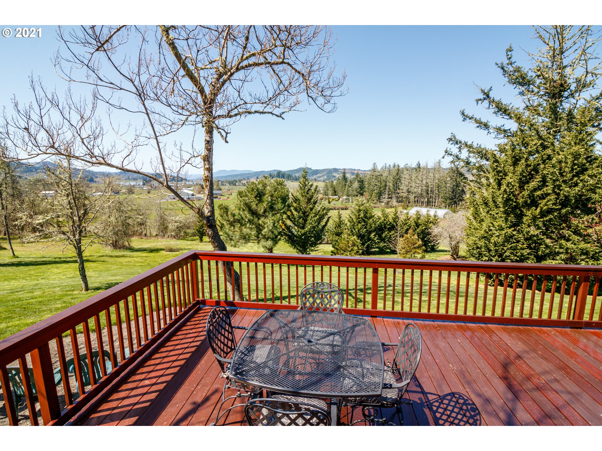 487 Fir Vista Road Sutherlin, OR 97479 - Photo 25 of 32 a view of balcony with wooden floor and fence
