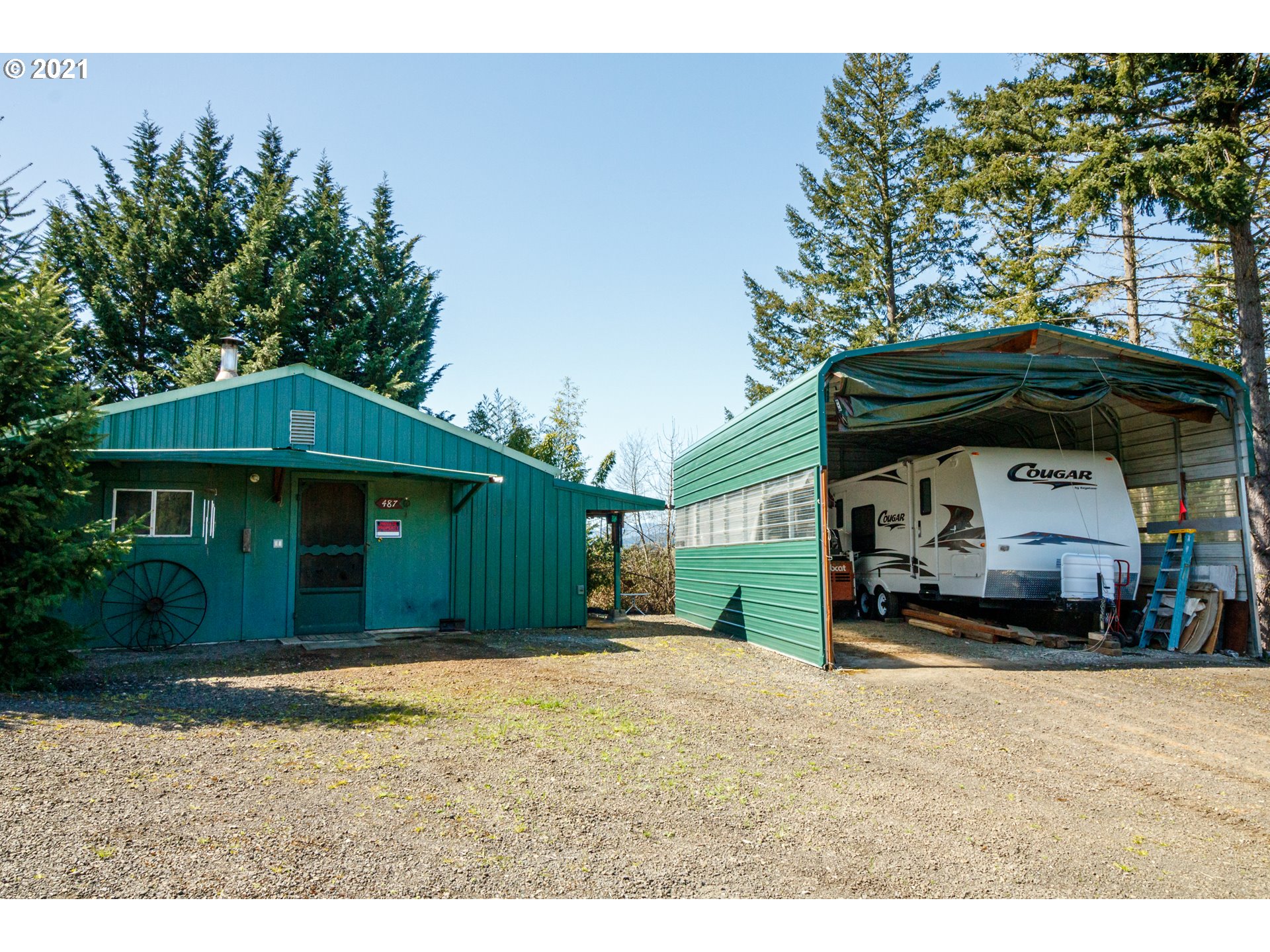487 Fir Vista Road Sutherlin, OR 97479 - Photo 29 of 32 a front view of a house with a yard