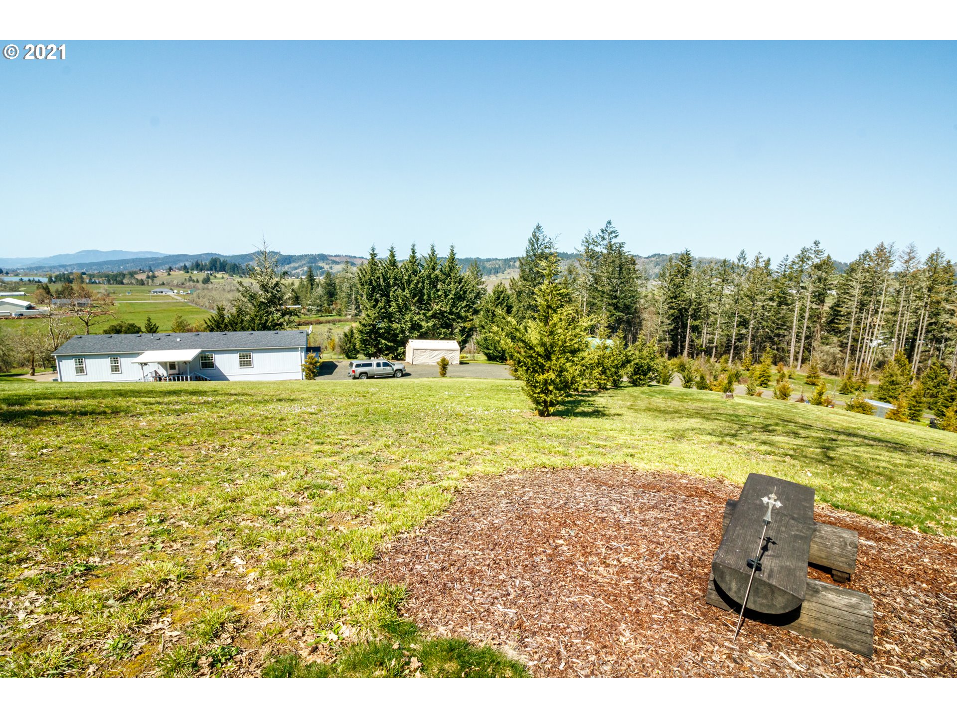 487 Fir Vista Road Sutherlin, OR 97479 - Photo 4 of 32 a view of a lake with a big yard