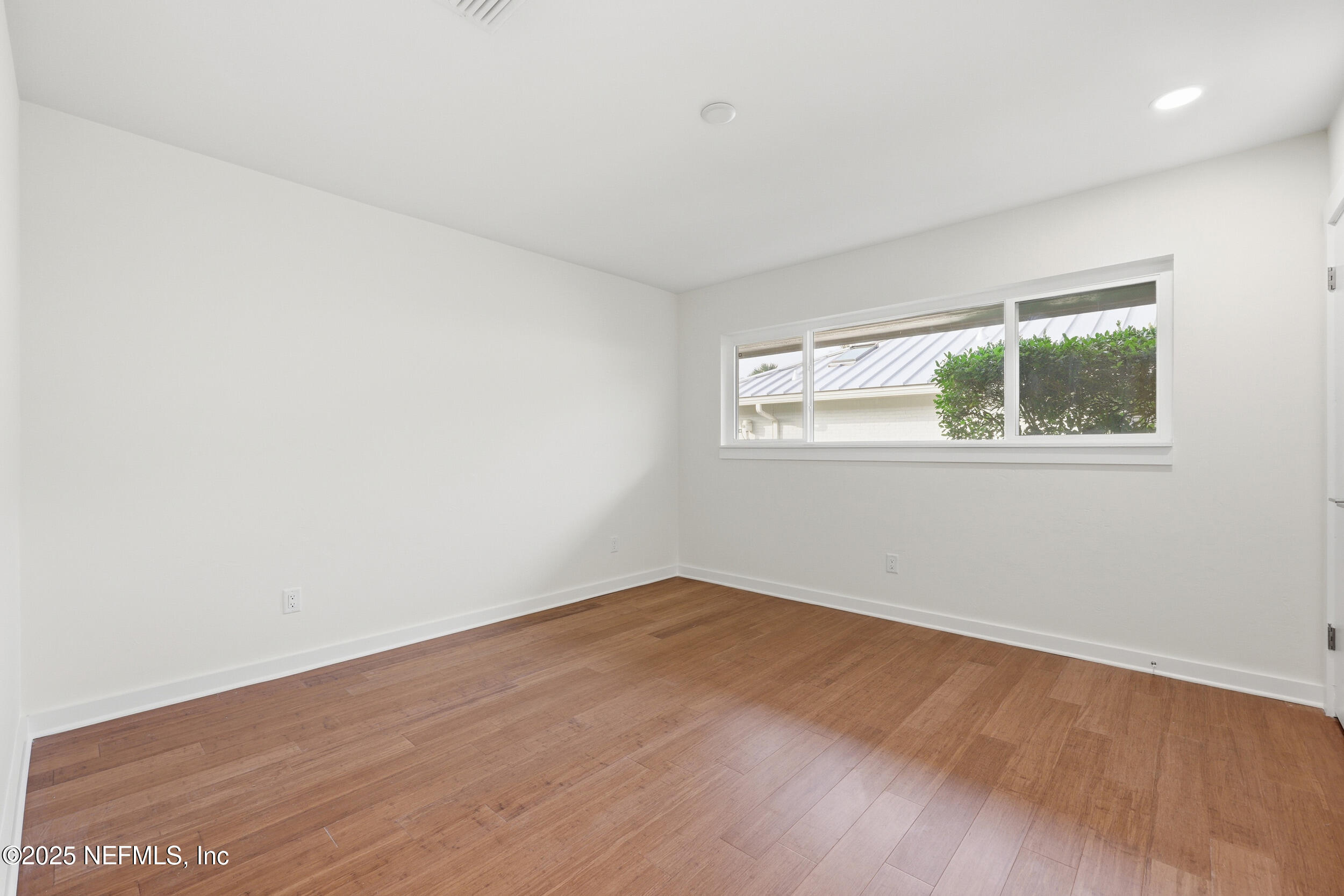 330 San Juan Drive Ponte Vedra Beach, FL 32082 - Photo 21 of 32 an empty room with a window