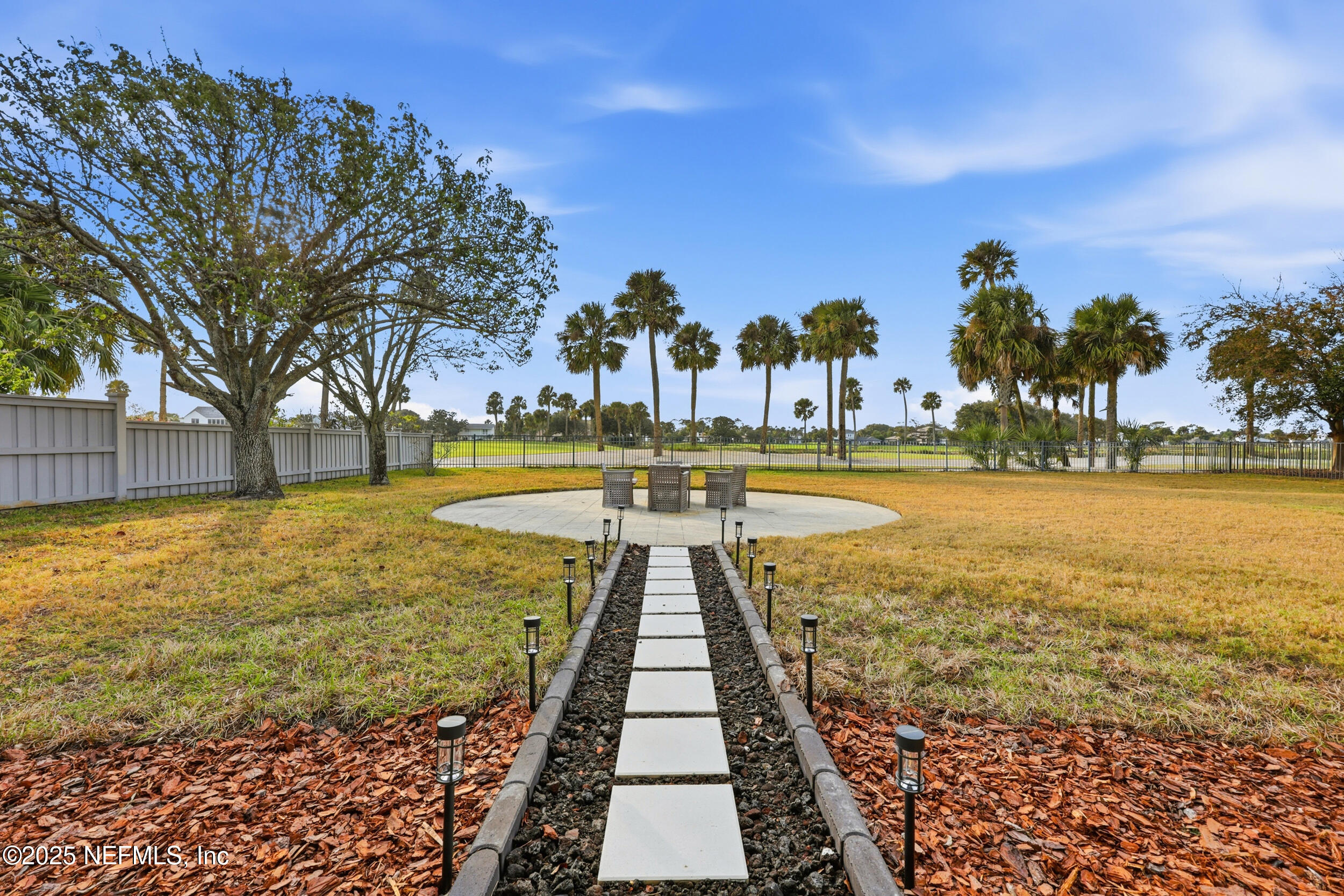 330 San Juan Drive Ponte Vedra Beach, FL 32082 - Photo 25 of 32 a view of a swimming pool and an outdoor space