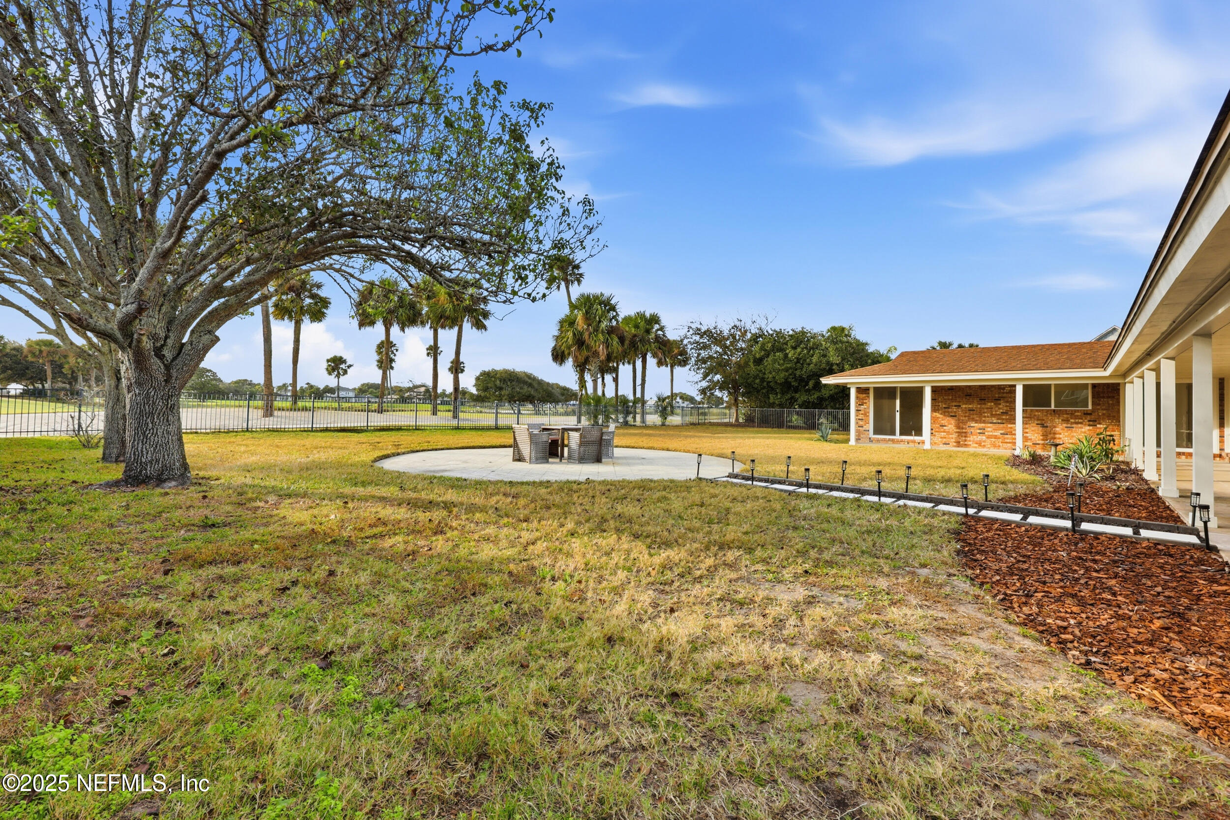 330 San Juan Drive Ponte Vedra Beach, FL 32082 - Photo 27 of 32 a front view of a house with a yard