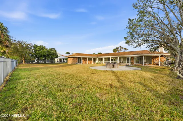 a view of a park with palm trees