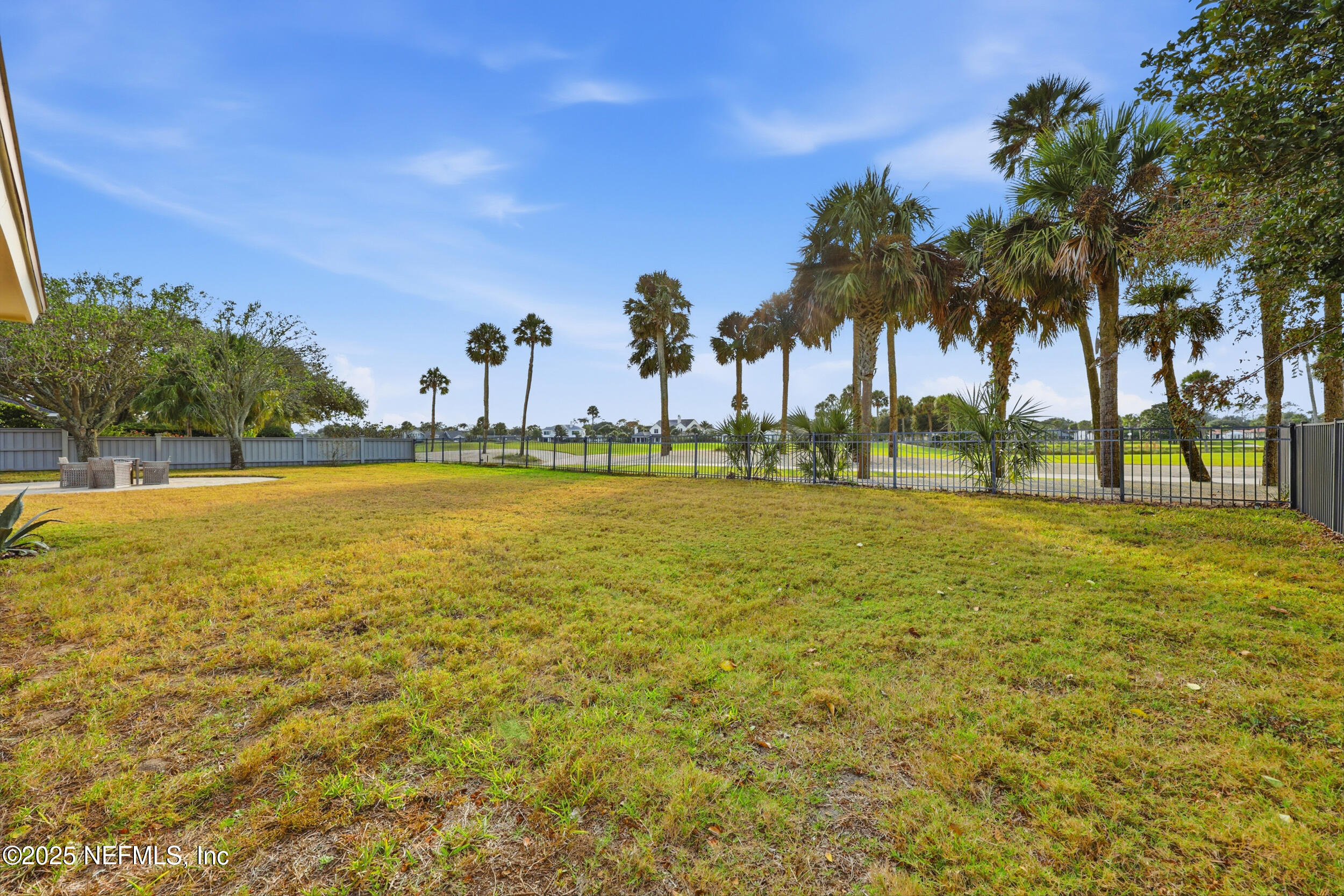 330 San Juan Drive Ponte Vedra Beach, FL 32082 - Photo 30 of 32 a view of a swimming pool with an outdoor space and seating area