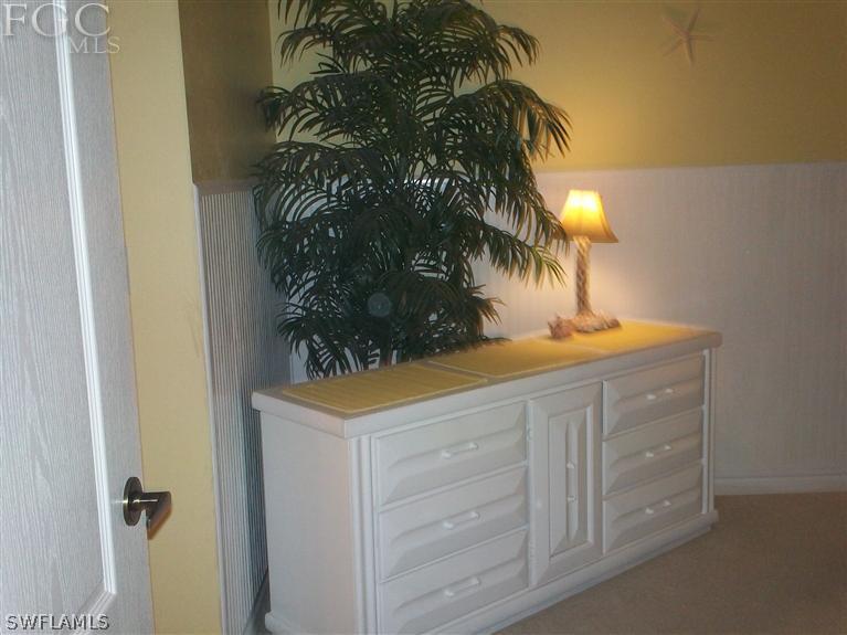14111 Brant Point Circle, Unit 236 Fort Myers, FL 33919 - Photo 12 of 22 a bathroom with a sink and a mirror