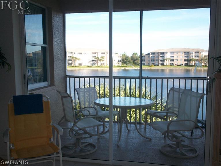 14111 Brant Point Circle, Unit 236 Fort Myers, FL 33919 - Photo 20 of 22 a view of a chairs and table in patio