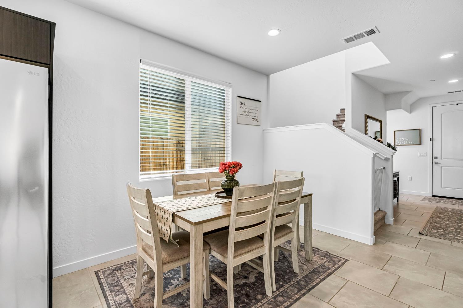 367 Talus Way South Madera, CA 93636 - Photo 8 of 40 a view of a dining room with furniture and window
