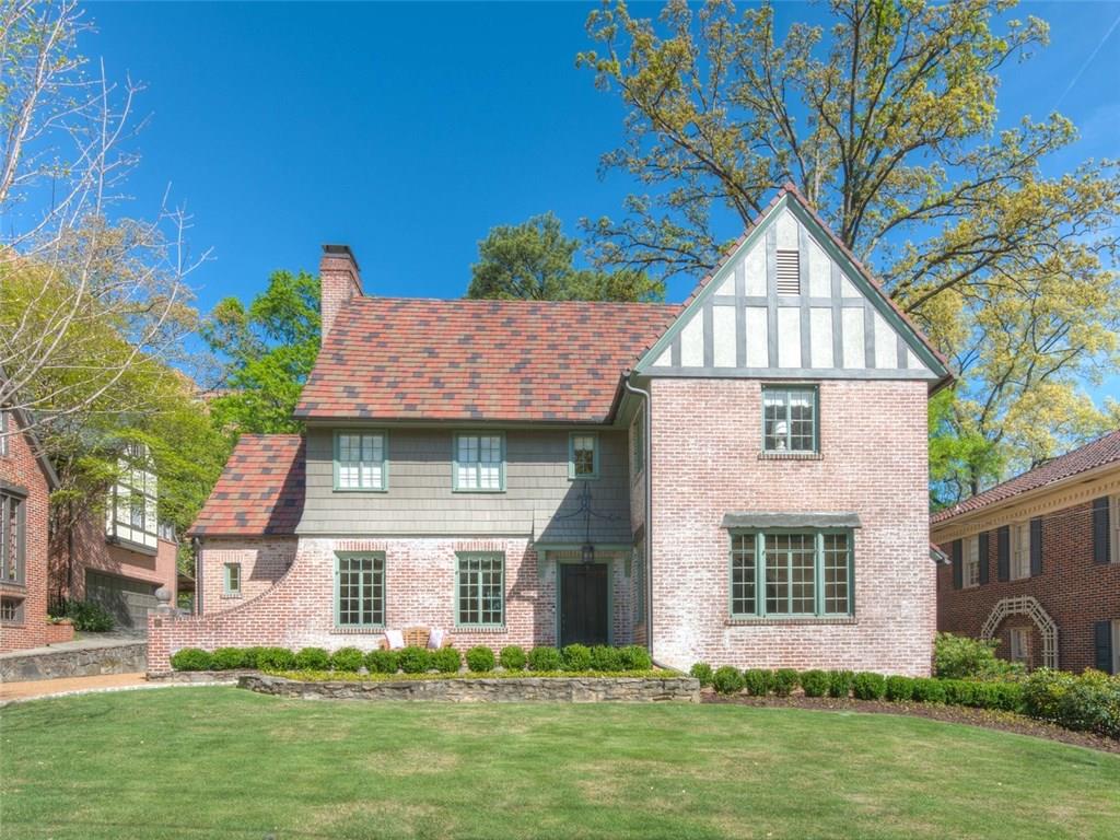 82 Brighton Road Northeast Atlanta, GA 30309 - Photo 1 of 1 front view of a house with a yard