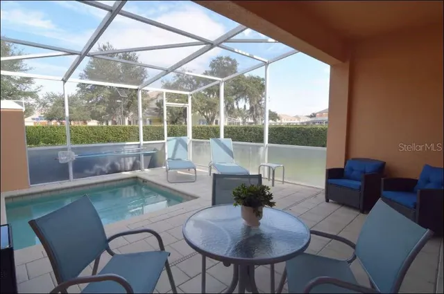 a house view with a seating space and sitting space