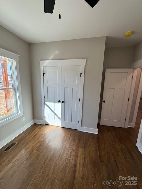 3006 Polkville Road Shelby, NC 28150 - Photo 11 of 29 an empty room with wooden floor and windows