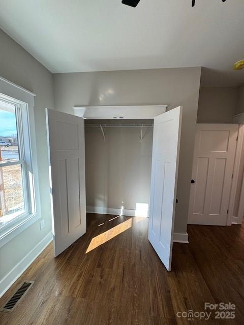 3006 Polkville Road Shelby, NC 28150 - Photo 12 of 29 a view of an empty room with wooden floor and a window