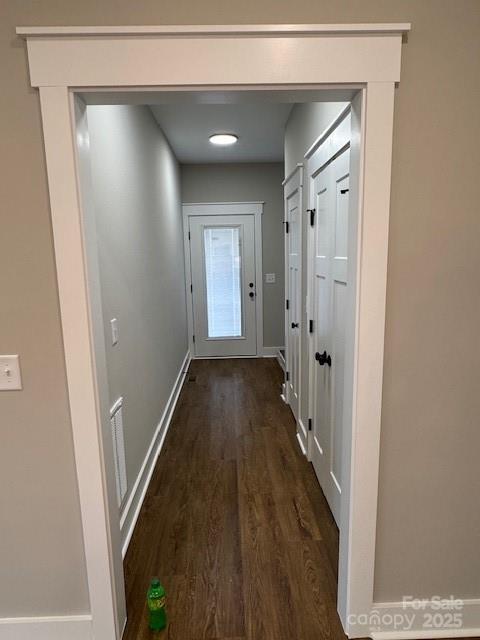 3006 Polkville Road Shelby, NC 28150 - Photo 19 of 29 a view of a hallway with wooden floor and staircase